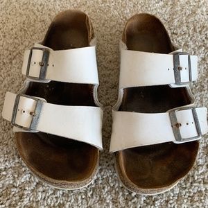 White leather Birkenstock shoes